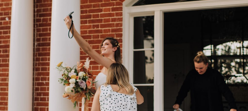 Bride Taking Selfie | Reymerston Hall